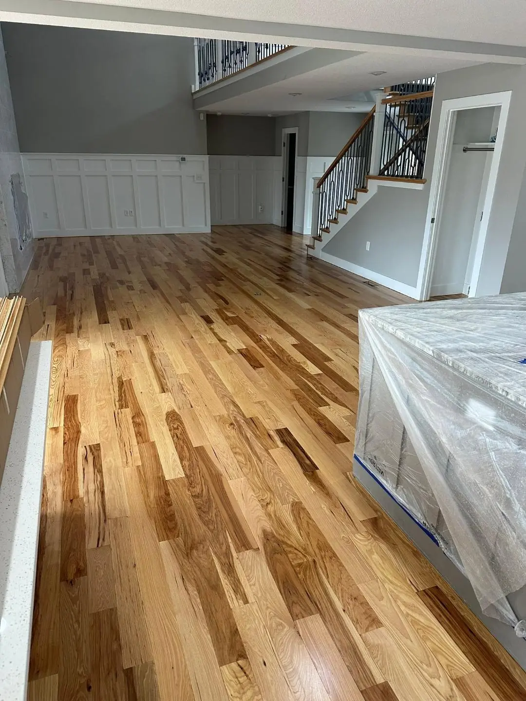 Luxury vinyl plank flooring in a finished basement